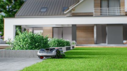 Sunseeker X7 Gen 2 following the lawn edge beside a modern home