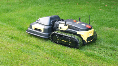 Yarbo Core with the Lawn Mower module cutting a lawn, the cut stripe visible behind it
