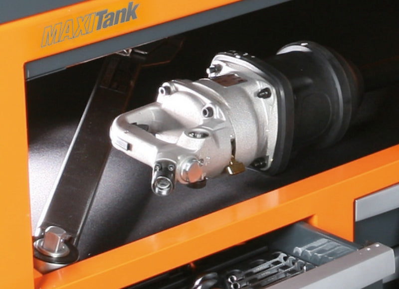 An impact wrench sitting on the oil-proof rubber-coated C30M worktop with its raised lip