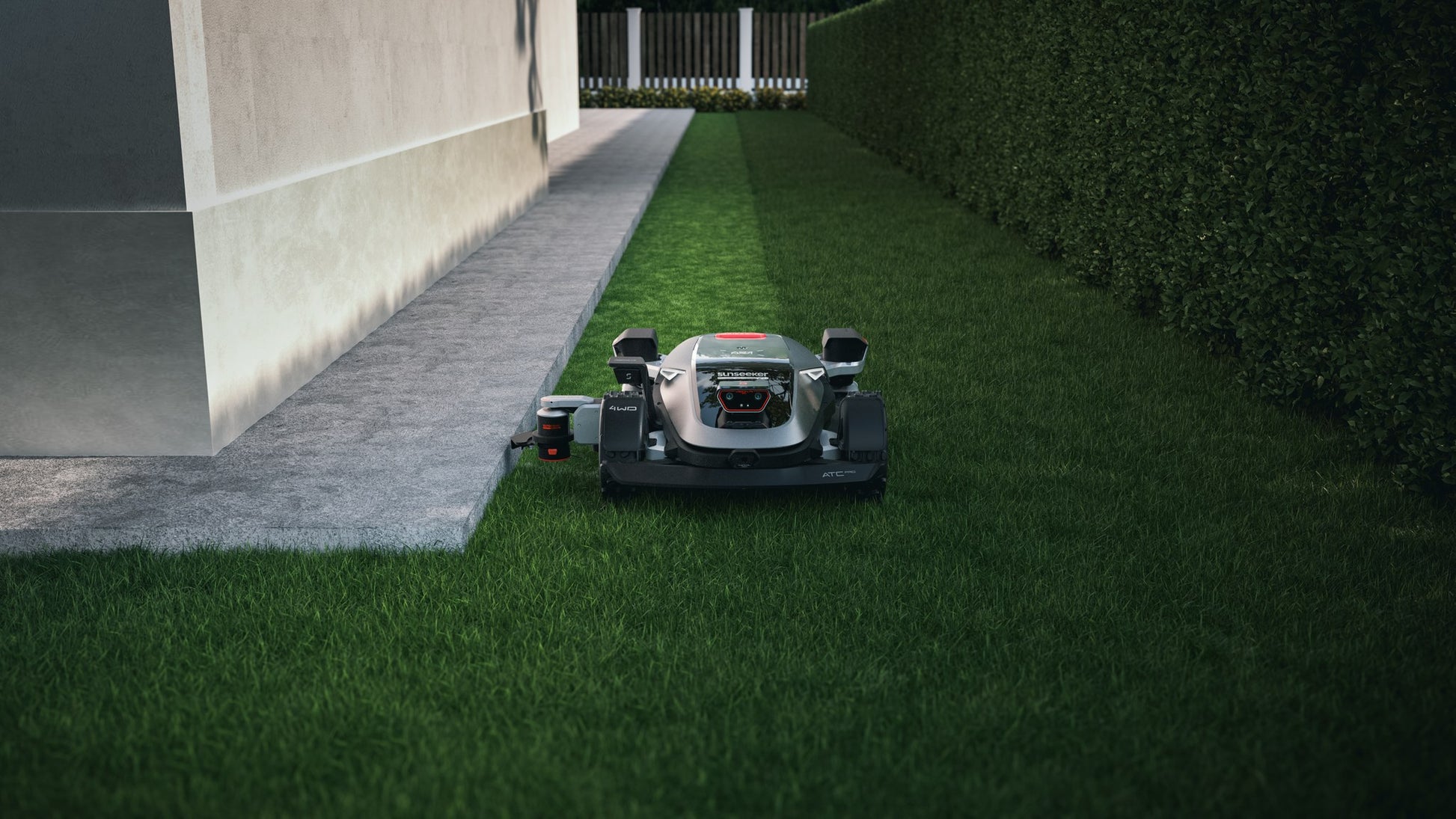 Sunseeker X9 Plus using the EdgeZero trimmer arm along a wall edge