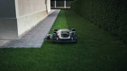 Sunseeker X9 Plus using the EdgeZero trimmer arm along a wall edge