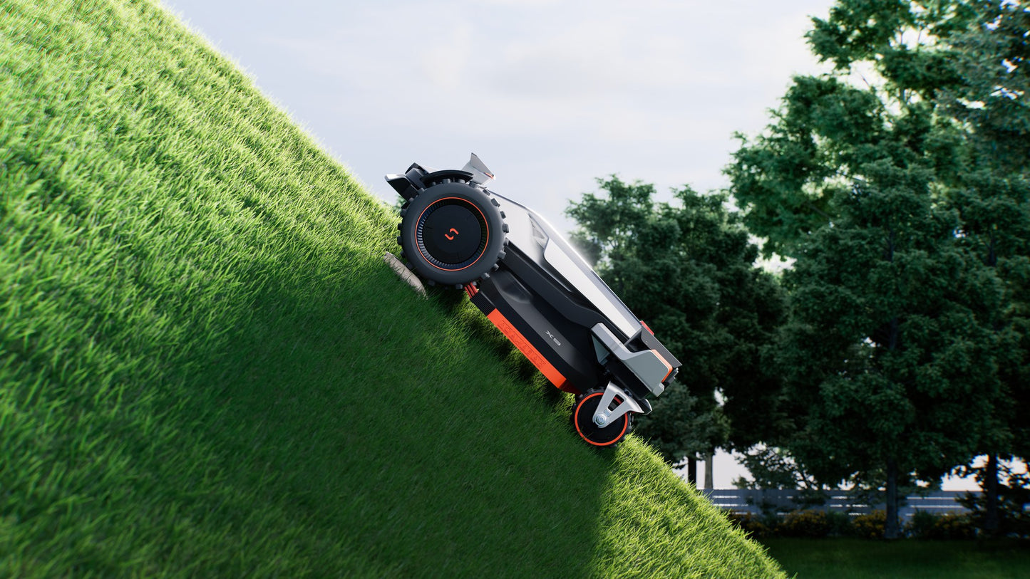 Sunseeker X9 Plus climbing a steep grass slope