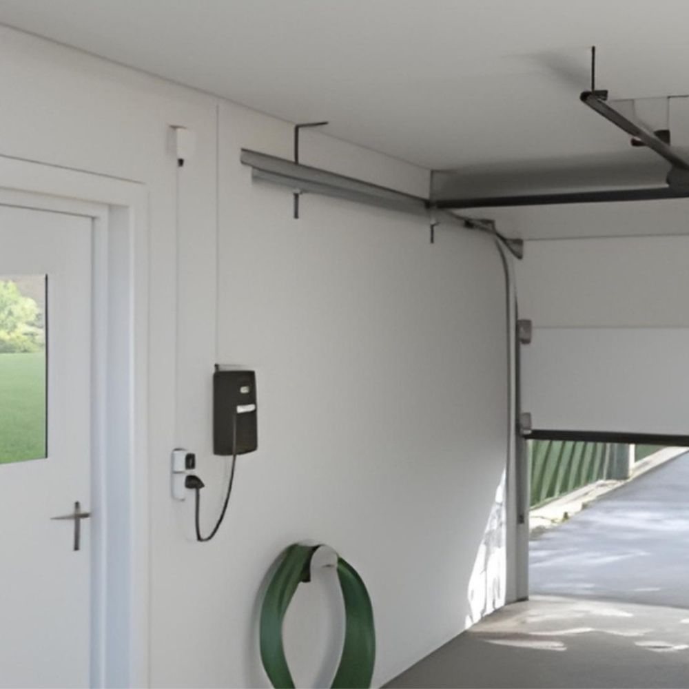 Sommer 2060 pro+ opener shown with its remote, safety sensors and wall control