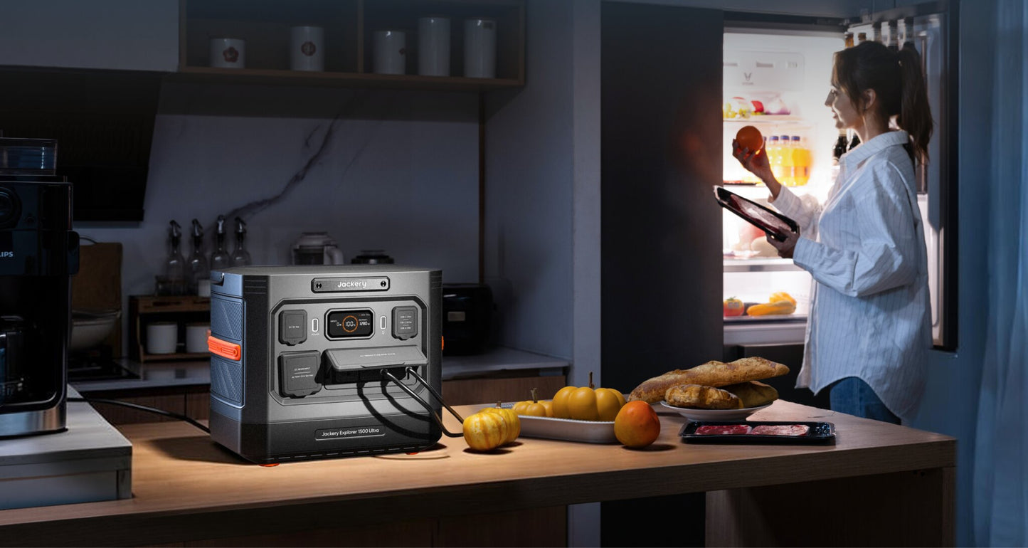 Jackery Explorer 1500 Ultra powering a kitchen counter setup during a nighttime power outage