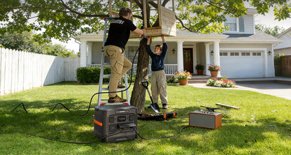Jackery Explorer 1500 Ultra powering a drill in the yard while a father and son build a treehouse