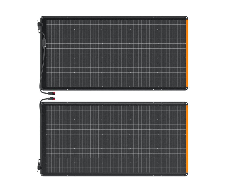 Two unfolded SolarSaga 500X solar panels laid flat side by side on white background