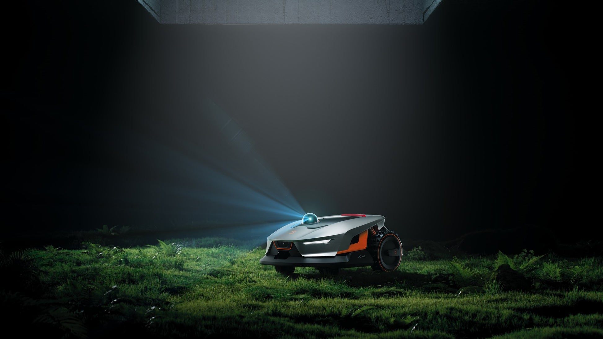 Sunseeker X4 lit at dusk on a lawn with its LED headlight on