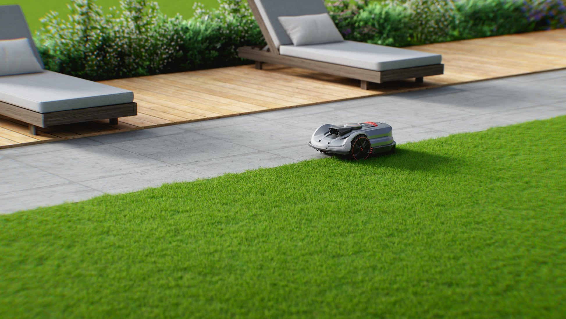 Sunseeker X7 Gen 2 mowing at a patio edge
