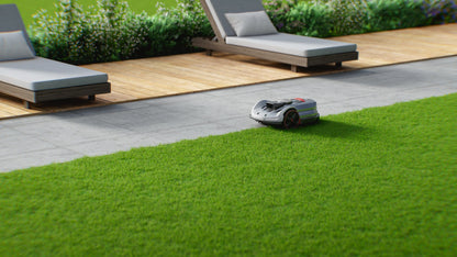 Sunseeker X7 Gen 2 mowing at a patio edge