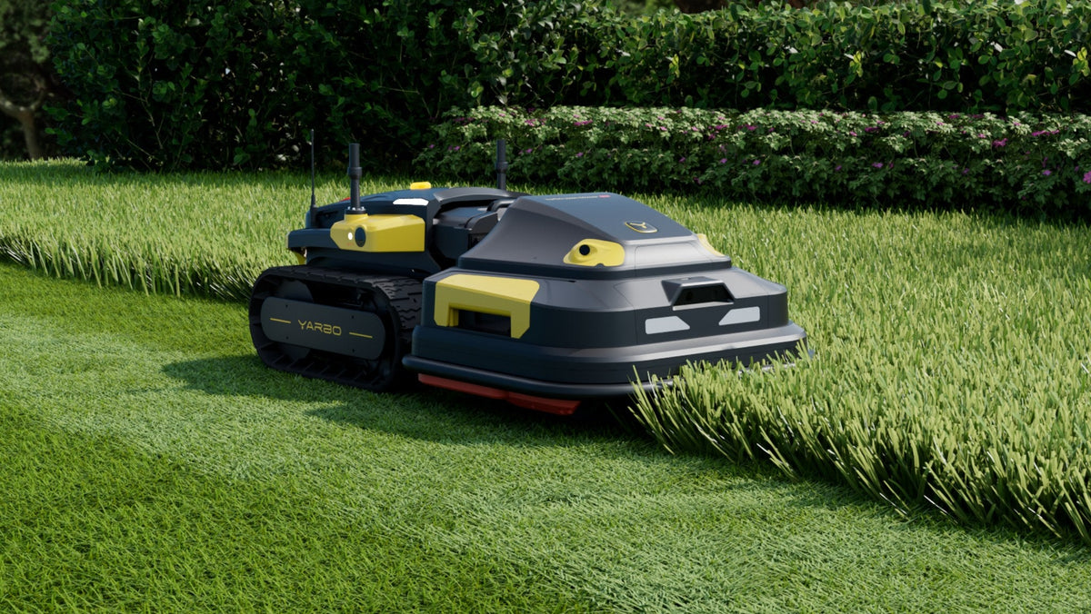Yarbo Lawn Mower Pro module cutting close along a hedge line